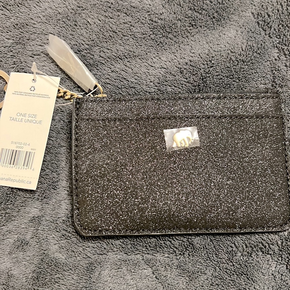 Black sparkly key ring wallet by Banana Republic.